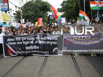 Citizens take part in a protest march in Kolkata, India, on September 1, 2024, against the rape and murder of a PGT doctor. (