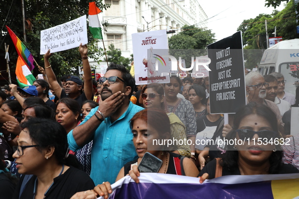 Citizens take part in a protest march in Kolkata, India, on September 1, 2024, against the rape and murder of a PGT doctor. 