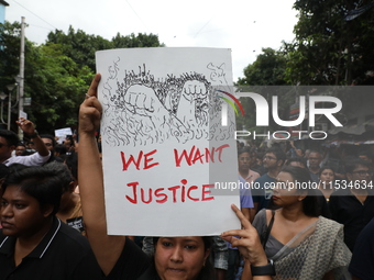 Citizens take part in a protest march in Kolkata, India, on September 1, 2024, against the rape and murder of a PGT doctor. (