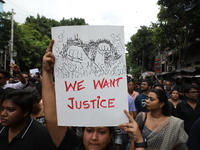 Citizens take part in a protest march in Kolkata, India, on September 1, 2024, against the rape and murder of a PGT doctor. (