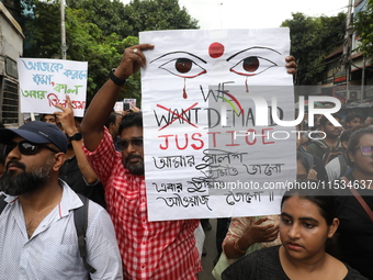 Citizens take part in a protest march in Kolkata, India, on September 1, 2024, against the rape and murder of a PGT doctor. (