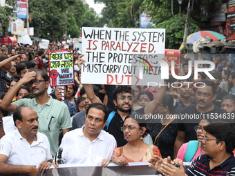 Citizens take part in a protest march in Kolkata, India, on September 1, 2024, against the rape and murder of a PGT doctor. (