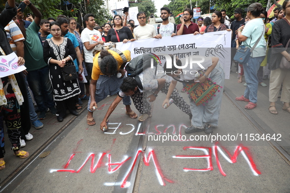 Citizens take part in a protest march in Kolkata, India, on September 1, 2024, against the rape and murder of a PGT doctor. 