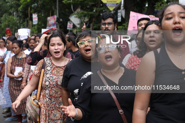 Citizens take part in a protest march in Kolkata, India, on September 1, 2024, against the rape and murder of a PGT doctor. 