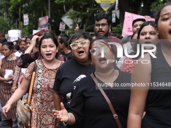 Citizens take part in a protest march in Kolkata, India, on September 1, 2024, against the rape and murder of a PGT doctor. (