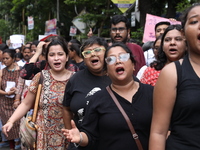 Citizens take part in a protest march in Kolkata, India, on September 1, 2024, against the rape and murder of a PGT doctor. (