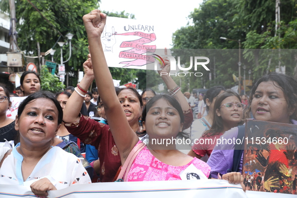 Citizens take part in a protest march in Kolkata, India, on September 1, 2024, against the rape and murder of a PGT doctor. 