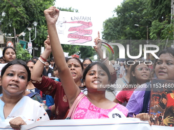 Citizens take part in a protest march in Kolkata, India, on September 1, 2024, against the rape and murder of a PGT doctor. (