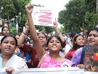 Citizens take part in a protest march in Kolkata, India, on September 1, 2024, against the rape and murder of a PGT doctor. (