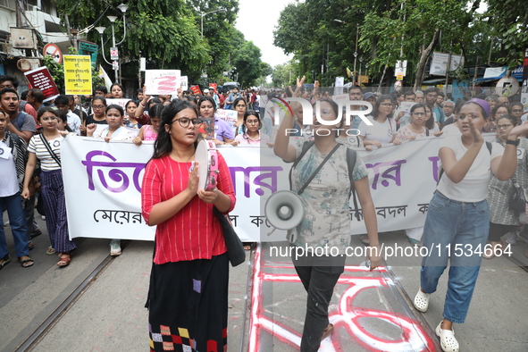 Citizens take part in a protest march in Kolkata, India, on September 1, 2024, against the rape and murder of a PGT doctor. 