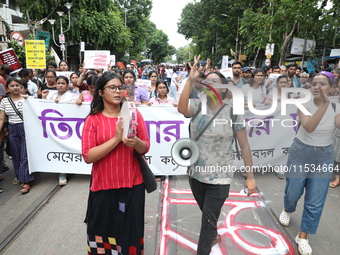 Citizens take part in a protest march in Kolkata, India, on September 1, 2024, against the rape and murder of a PGT doctor. (