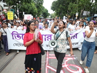 Citizens take part in a protest march in Kolkata, India, on September 1, 2024, against the rape and murder of a PGT doctor. (