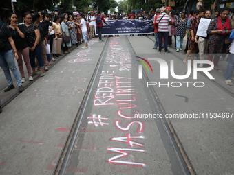 Citizens take part in a protest march in Kolkata, India, on September 1, 2024, against the rape and murder of a PGT doctor. (