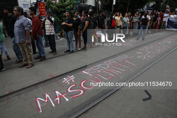 Citizens take part in a protest march in Kolkata, India, on September 1, 2024, against the rape and murder of a PGT doctor. 