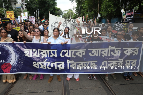 Citizens take part in a protest march in Kolkata, India, on September 1, 2024, against the rape and murder of a PGT doctor. 