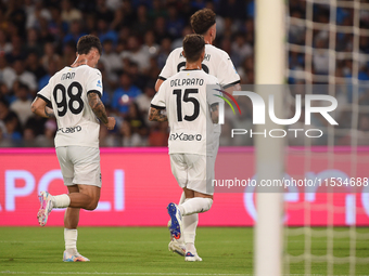 Ange-Yoan Bonny of Parma Calcio celebrates with team mates after scoring during the Serie A match between SSC Napoli and Parma Calcio at Sta...