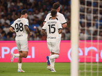 Ange-Yoan Bonny of Parma Calcio celebrates with team mates after scoring during the Serie A match between SSC Napoli and Parma Calcio at Sta...