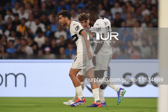 Ange-Yoan Bonny of Parma Calcio celebrates with team mates after scoring during the Serie A match between SSC Napoli and Parma Calcio at Sta...