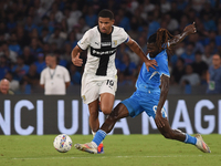 Simon Sohm of Parma Calcio competes for the ball with Andre-Frank Zambo Anguissa of SSC Napoli during the Serie A match between SSC Napoli a...