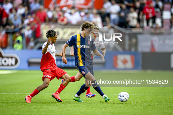 FC Utrecht player Alonzo Engwanda, FC Twente player Sam Lammers, and FC Utrecht player Jens Toornstra during the match Utrecht - Twente at t...