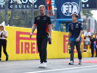 Kevin Magnussen of Haas and Franco Colapinto of Williams before the Formula 1 Italian Grand Prix at Autodromo Nazionale di Monza in Monza, I...