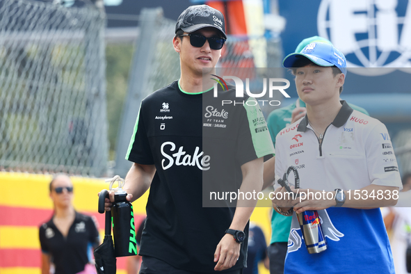 Zhou Guanyu of Kick Sauber and Yuki Tsunoda of RB before the Formula 1 Italian Grand Prix at Autodromo Nazionale di Monza in Monza, Italy on...