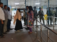 Bangladesh army personnel stand guard at Dhaka Medical College Hospital as medical services in the emergency department remain suspended in...