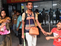 Bangladesh army personnel stand guard at Dhaka Medical College Hospital as medical services in the emergency department remain suspended in...