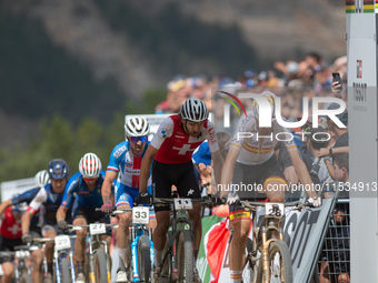 Cyclists participate in the UCI Mountain Bike World Championships Men in Pal Arinsal, Andorra, on September 1, 2024. (