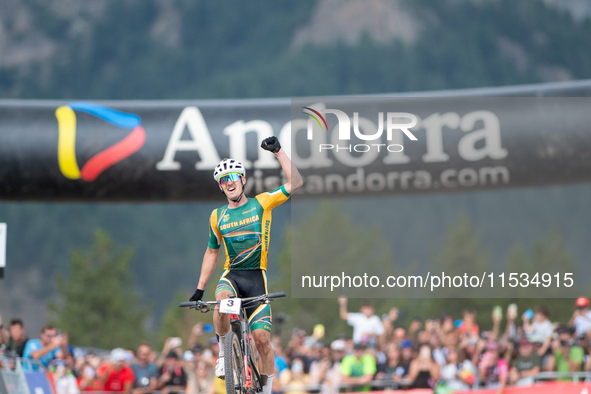 Alan Hatherly of South Africa crosses the finish line in the UCI Mountain Bike World Championships Men Under 23 Race in Pal Arinsal, Andorra...