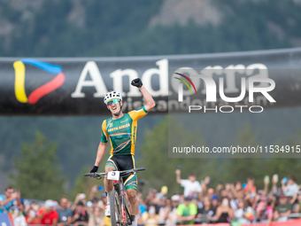 Alan Hatherly of South Africa crosses the finish line in the UCI Mountain Bike World Championships Men Under 23 Race in Pal Arinsal, Andorra...