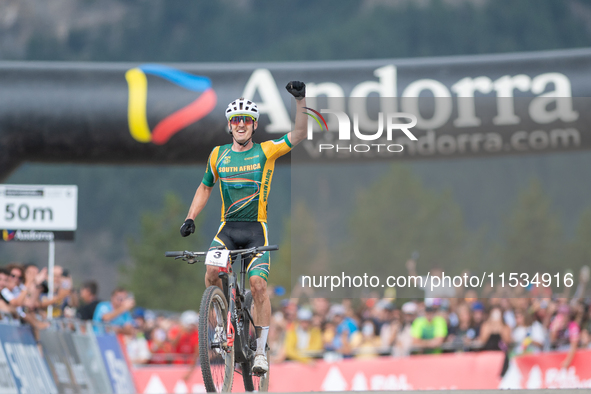 Alan Hatherly of South Africa crosses the finish line in the UCI Mountain Bike World Championships Men Under 23 Race in Pal Arinsal, Andorra...