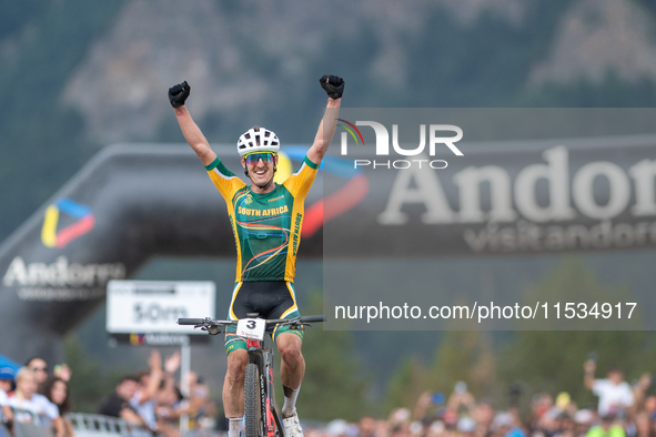 Alan Hatherly of South Africa crosses the finish line in the UCI Mountain Bike World Championships Men Under 23 Race in Pal Arinsal, Andorra...