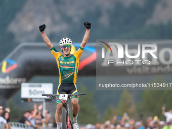 Alan Hatherly of South Africa crosses the finish line in the UCI Mountain Bike World Championships Men Under 23 Race in Pal Arinsal, Andorra...