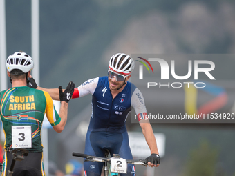 Victor Koretzky of France crosses the finish line in the UCI Mountain Bike World Championships Men Under 23 Race in Pal Arinsal, Andorra, on...