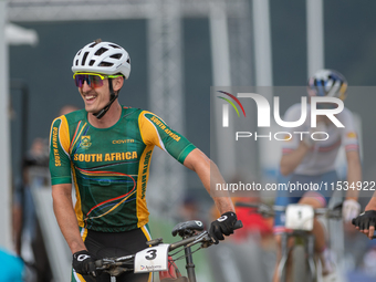 Alan Hatherly of South Africa crosses the finish line in the UCI Mountain Bike World Championships Men Under 23 Race in Pal Arinsal, Andorra...