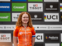 Puck Pieterse of the Netherlands stands on the podium at the UCI Mountain Bike World Championships Women in Pal Arinsal, Andorra, on Septemb...