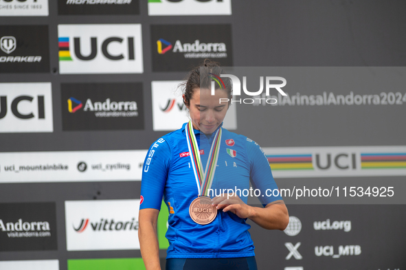 Martina Berta of Italy stands on the podium at the UCI Mountain Bike World Championships Women in Pal Arinsal, Andorra, on September 1, 2024...