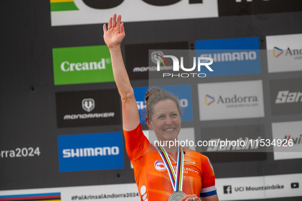 Anna Terpstra of the Netherlands stands on the podium at the UCI Mountain Bike World Championships Women in Pal Arinsal, Andorra, on Septemb...