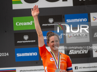 Anna Terpstra of the Netherlands stands on the podium at the UCI Mountain Bike World Championships Women in Pal Arinsal, Andorra, on Septemb...