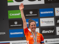 Anna Terpstra of the Netherlands stands on the podium at the UCI Mountain Bike World Championships Women in Pal Arinsal, Andorra, on Septemb...