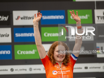 Puck Pieterse of the Netherlands stands on the podium at the UCI Mountain Bike World Championships Women in Pal Arinsal, Andorra, on Septemb...