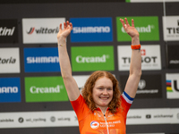 Puck Pieterse of the Netherlands stands on the podium at the UCI Mountain Bike World Championships Women in Pal Arinsal, Andorra, on Septemb...