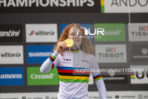 Puck Pieterse of the Netherlands stands on the podium at the UCI Mountain Bike World Championships Women in Pal Arinsal, Andorra, on Septemb...