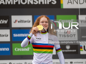 Puck Pieterse of the Netherlands stands on the podium at the UCI Mountain Bike World Championships Women in Pal Arinsal, Andorra, on Septemb...