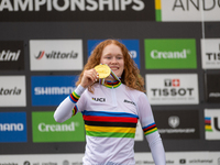 Puck Pieterse of the Netherlands stands on the podium at the UCI Mountain Bike World Championships Women in Pal Arinsal, Andorra, on Septemb...