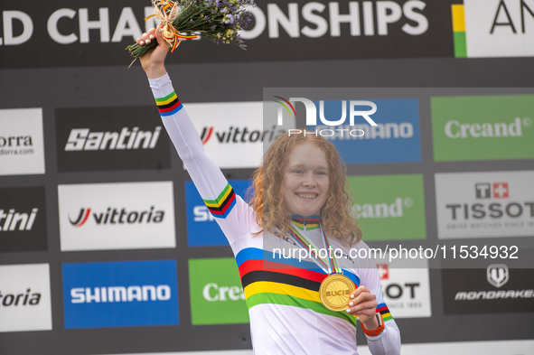 Puck Pieterse of the Netherlands stands on the podium at the UCI Mountain Bike World Championships Women in Pal Arinsal, Andorra, on Septemb...