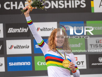 Puck Pieterse of the Netherlands stands on the podium at the UCI Mountain Bike World Championships Women in Pal Arinsal, Andorra, on Septemb...