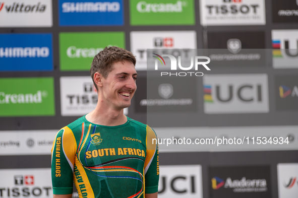 Alan Hatherly of South Africa stands on the podium at the UCI Mountain Bike World Championships Men Under 23 Race in Pal Arinsal, Andorra, o...