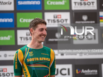 Alan Hatherly of South Africa stands on the podium at the UCI Mountain Bike World Championships Men Under 23 Race in Pal Arinsal, Andorra, o...